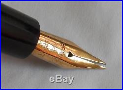 Rexall Black Chased Hard Rubber Thumb Filler-very flexible fine point nib